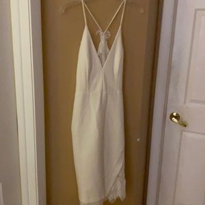 Beautiful off white dress. Never worn with tag.